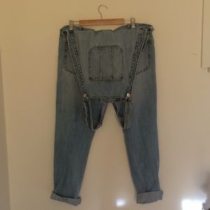 Distressed denim overalls